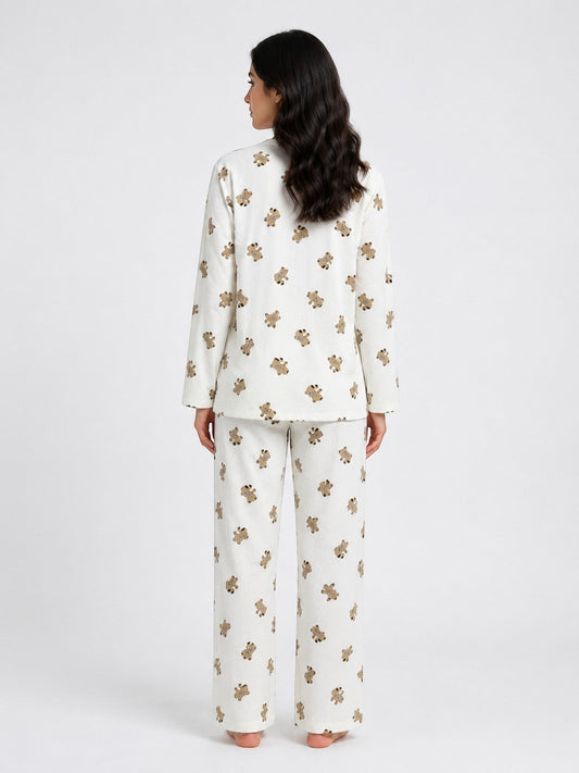Back view of a woman wearing a Chillpjs Honey Bear loungewear set in cream popcorn crinkle fabric with teddy bears.