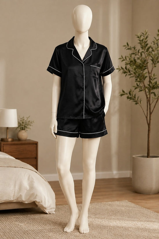 Chillpjs black silk short set with contrast piping worn by a mannequin