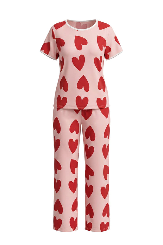 Chillpjs blush pink cotton pajama set with short sleeves and red heart print, featuring a relaxed fit and elastic waist.