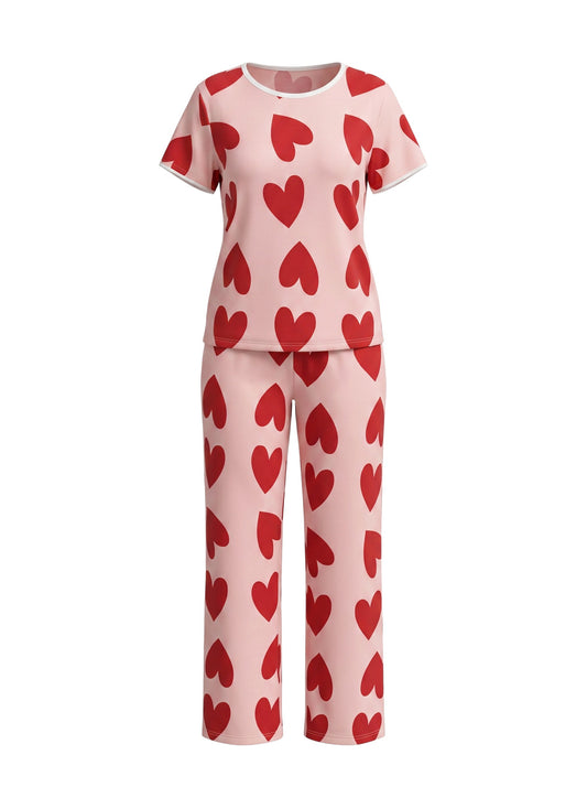 Chillpjs blush pink cotton pajama set with short sleeves and red heart print, featuring a relaxed fit and elastic waist.