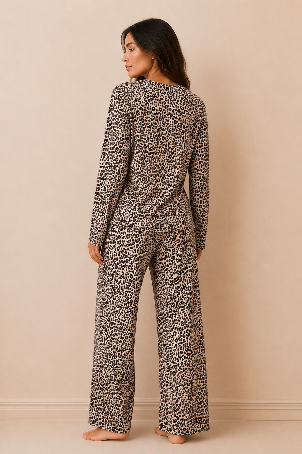 Chillpjs cheetah print long-sleeve lounge set worn by a woman, featuring straight-fit trousers in soft breathable fabric.