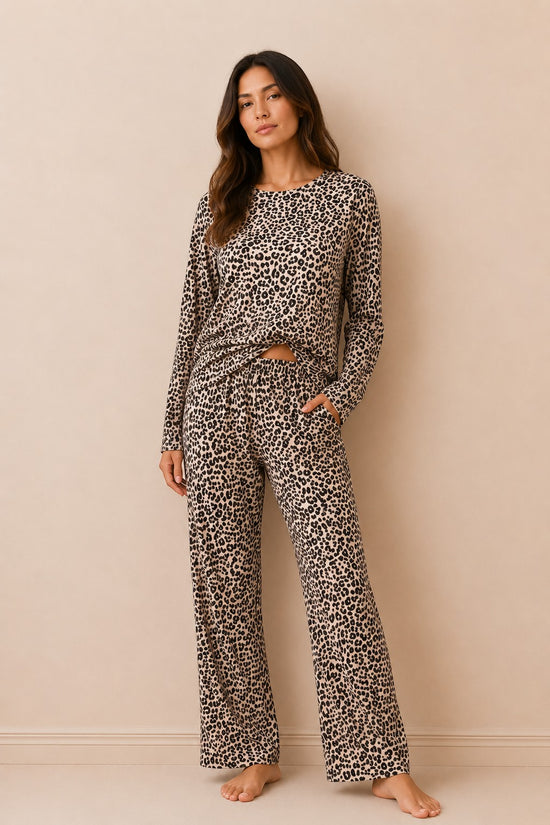 Chillpjs cheetah print two-piece lounge set with full-sleeve top and straight-fit trousers on a female model