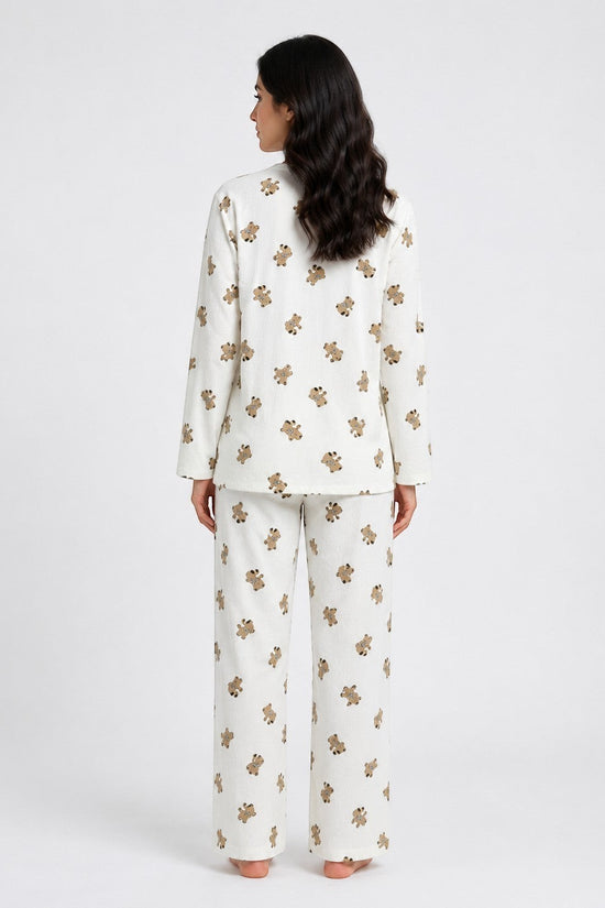 Back view of a woman wearing a Chillpjs Honey Bear loungewear set in cream popcorn crinkle fabric with teddy bears.