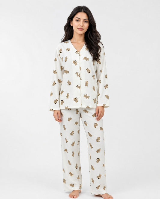 Model wearing Chillpjs Honey Bear textured popcorn crinkle loungewear set with V-neck top and relaxed trousers.