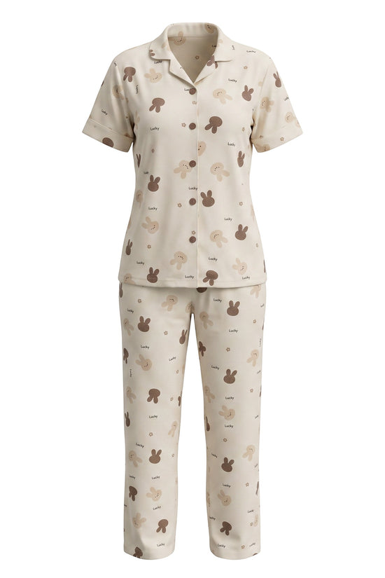 Chillpjs Lucky Bunny pajama set in sandstone cream popcorn crinkle fabric with chocolate brown bunny print.