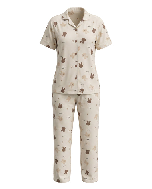 Chillpjs Lucky Bunny pajama set in sandstone cream popcorn crinkle fabric with chocolate brown bunny print.