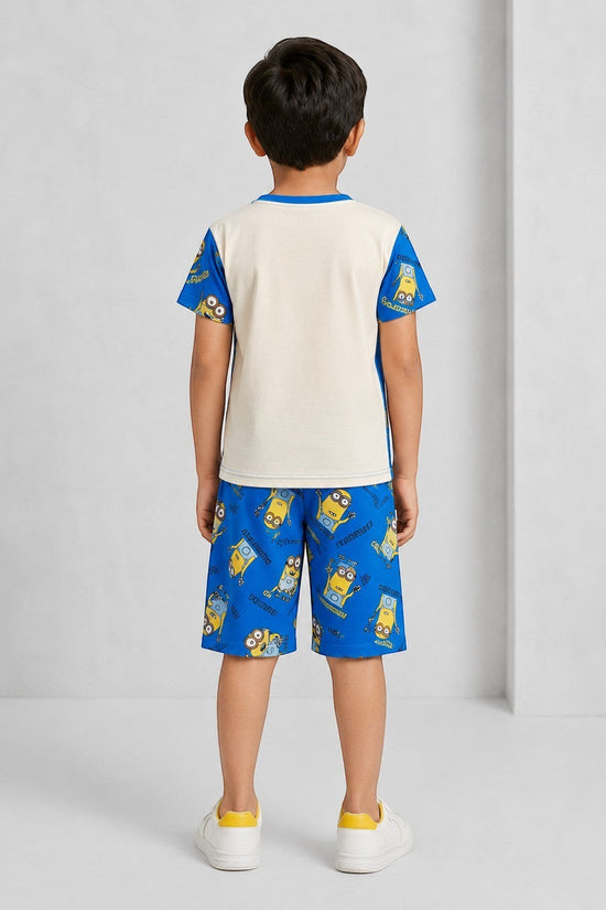 Back view of a boy wearing a Chillpjs Minions cotton shorts night suit with a blue and cream graphic print.