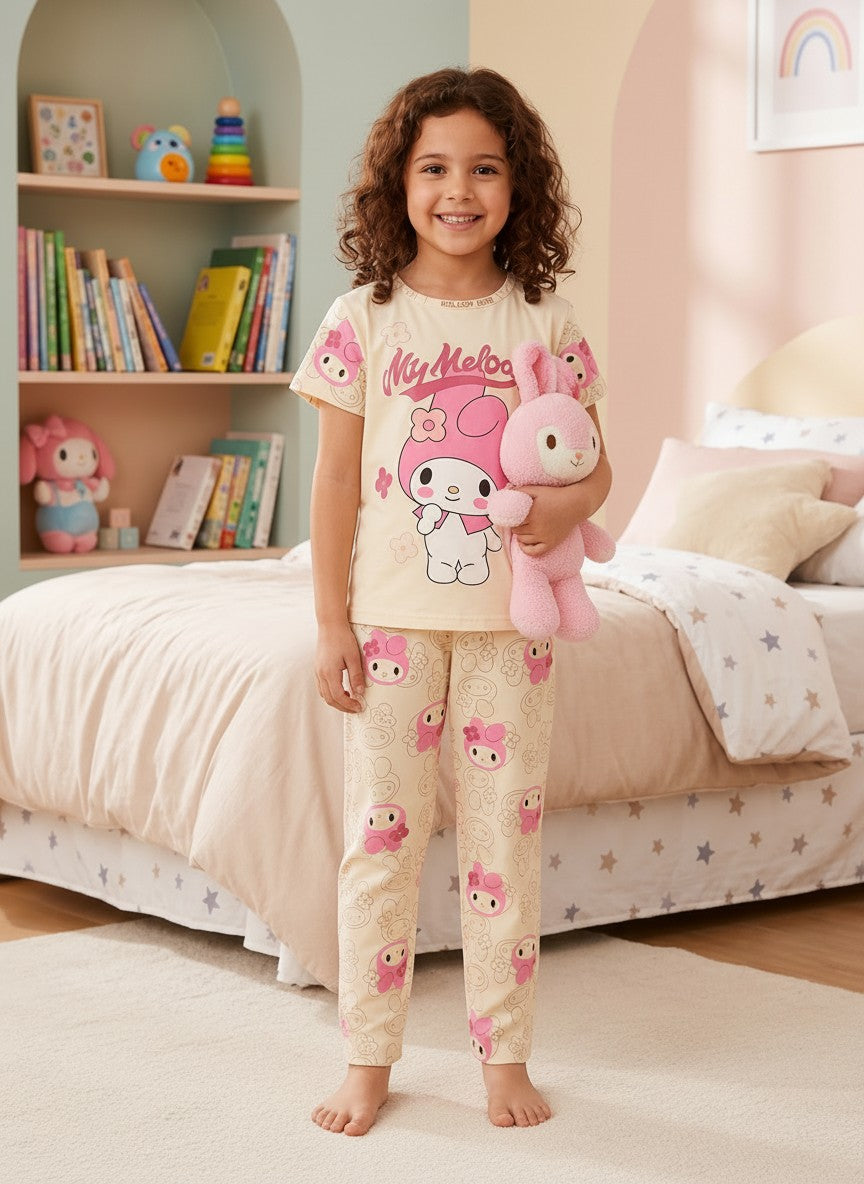 Chillpjs My Melody cotton night suit on a smiling girl holding a pink plush toy in a cozy bedroom setting.