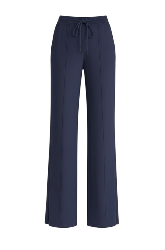 Chillpjs navy blue high-waisted wide-leg lounge pants with a drawstring waist, center seams, and side hem slits.