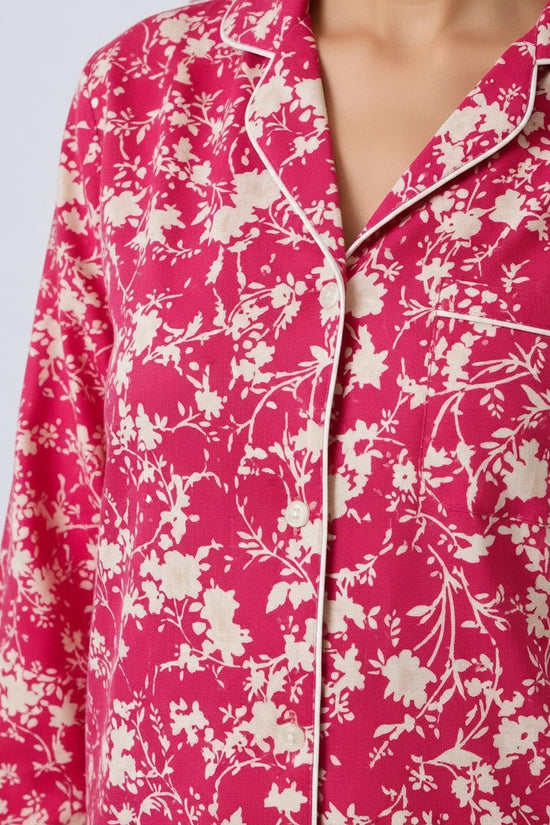 Chillpjs pink floral print button-down pajama top with white contrast piping and a notched collar.