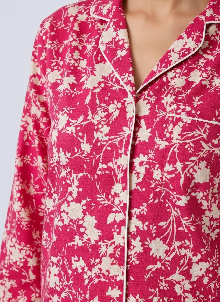 Chillpjs pink floral print button-down pajama top with white contrast piping and a notched collar.